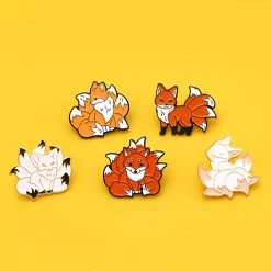 Juwas Cheeky Nine-Tailed Fox Embossed Pin